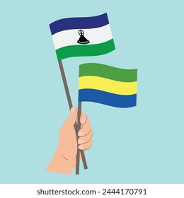 Flaggen von Lesotho und Gabun, Handfahnen