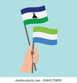 Flags of Lesotho and Sierra Leone, Hand Holding flags