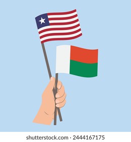 Flags of Liberia and Madagascar, Hand Holding flags
