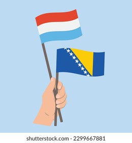 Flags of Luxembourg and Bosnia and Herzegovina, Hand Holding flags