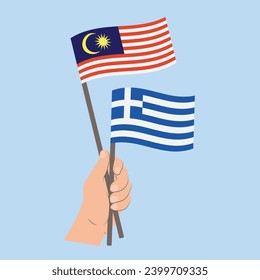 Banderas de Malasia y Grecia, con banderas de mano