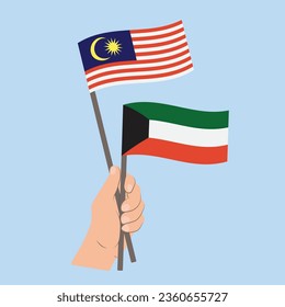 Flaggen Malaysias und Kuwaits, Flaggen von Hand