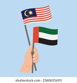 Flags of Malaysia and the United Arab Emirates, Hand Holding flags