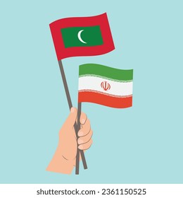 Flags of Maldives and Iran, Hand Holding flags