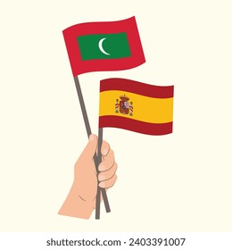 Flags of Maldives and Spain, Hand Holding flags
