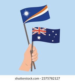 Flaggen der Marshallinseln und Australien, handgeführte Flaggen