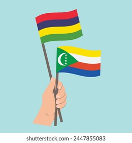 Flags of Mauritius and Comoros, Hand Holding flags