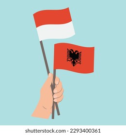Flags of Monaco and Albania, Hand Holding flags
