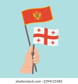 Flags of Montenegro and Georgia, Hand Holding flags