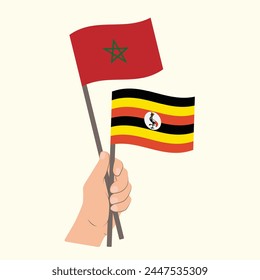 Flags of Morocco and Uganda, Hand Holding flags