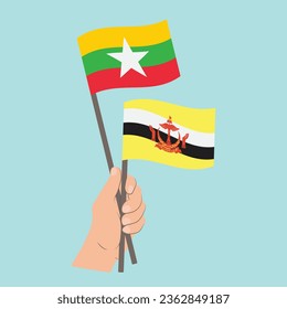 Flags of Myanmar and Brunei, Hand Holding flags