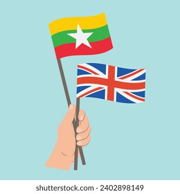 Flags of Myanmar and UK, Hand Holding flags