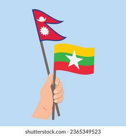 Banderas de Nepal y Myanmar, mano con banderas