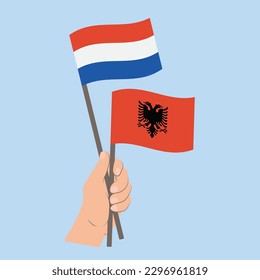 Flags of the Netherlands and Albania, Hand Holding flags