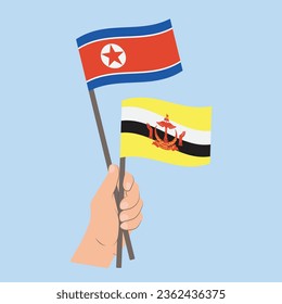 Flags of North Korea and Brunei, Hand Holding flags