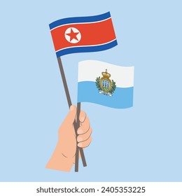 Flags of North Korea and San Marino, Hand Holding flags