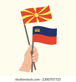 Flags of North Macedonia and Liechtenstein, Hand Holding flags