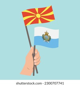 Flags of North Macedonia and San Marino, Hand Holding flags