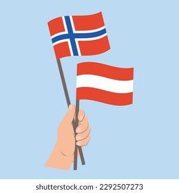 Flaggen Norwegens und Österreichs, handgeführte Flaggen