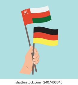 Flags of Oman and Germany, Hand Holding flags