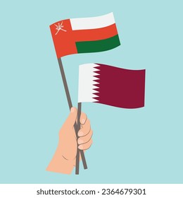 Flags of Oman and Qatar, Hand Holding flags