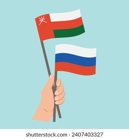 Flags of Oman and Russia, Hand Holding flags