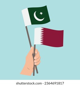 Banderas de Pakistán y Qatar, portando banderas