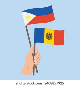 Flaggen der Philippinen und der Republik Moldau, handhabende Flaggen