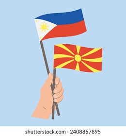 Flags of the Philippines and North Macedonia, Hand Holding flags