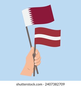 Flags of Qatar and Latvia, Hand Holding flags