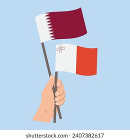 Banderas de Qatar y Malta, con banderas de mano
