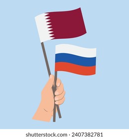 Flags of Qatar and Russia, Hand Holding flags