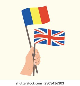 Flags of Romania and UK, Hand Holding flags