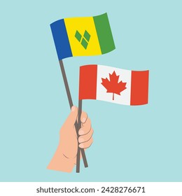 Flags of Saint Vincent and the Grenadines and Canada, Hand Holding flags