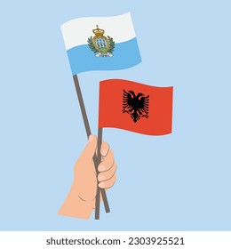 Flags of San Marino and Albania, Hand Holding flags