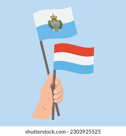 Flags of San Marino and Luxembourg, Hand Holding flags