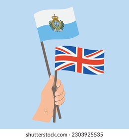 Flags of San Marino and UK, Hand Holding flags