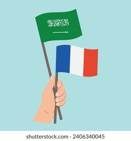 Flags of Saudi Arabia and France, Hand Holding flags