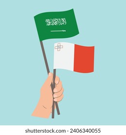 Flags of Saudi Arabia and Malta, Hand Holding flags