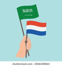 Flags of Saudi Arabia and the Netherlands, Hand Holding flags