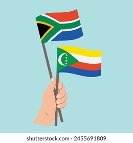 Flags of South Africa and Comoros, Hand Holding flags