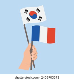 Banderas de Corea del Sur y Francia, con banderas de mano