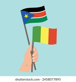 Flags of South Sudan and Mali, Hand Holding flags