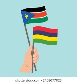 Flags of South Sudan and Mauritius, Hand Holding flags