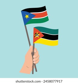 Flags of South Sudan and Mozambique, Hand Holding flags