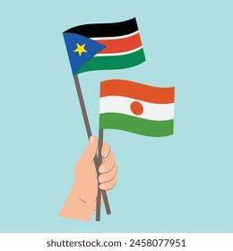 Flags of South Sudan and Niger, Hand Holding flags