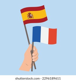 Flags of Spain and France, Hand Holding flags