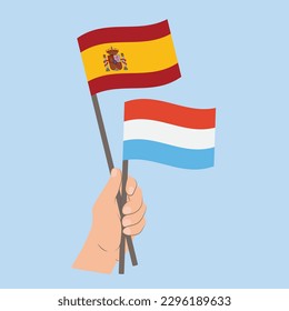 Flags of Spain and Luxembourg, Hand Holding flags