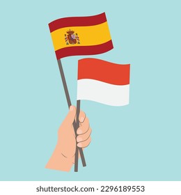 Flags of Spain and Monaco, Hand Holding flags