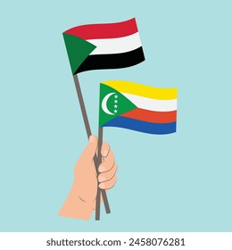 Flags of Sudan and Comoros, Hand Holding flags